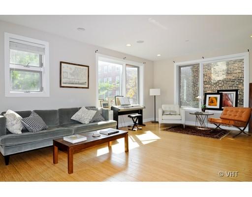 950 West Cullerton Street, Unit A Chicago, IL 60608 - Photo 2 of 12 a living room with furniture and a large window