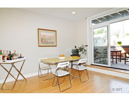 950 West Cullerton Street, Unit A Chicago, IL 60608 - Photo 5 of 12 a dining room with furniture and wooden floor