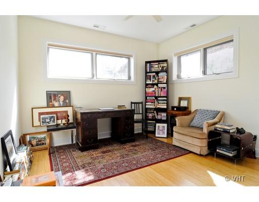 950 West Cullerton Street, Unit A Chicago, IL 60608 - Photo 9 of 12 a living room with furniture and a wooden floor