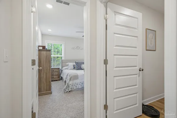 a view of bedroom with a bed and closet