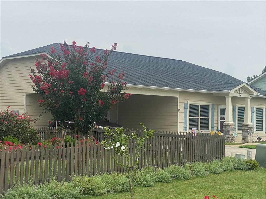 a house view with a garden space