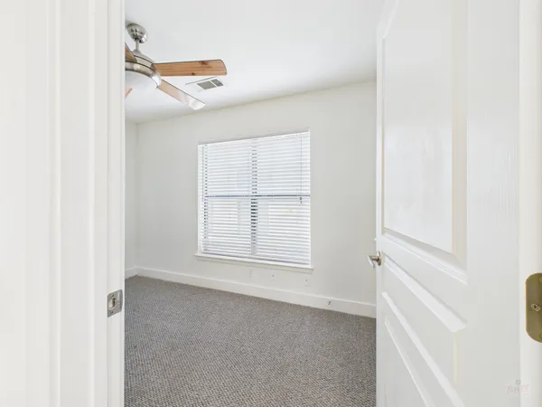 a view of a room with an empty space