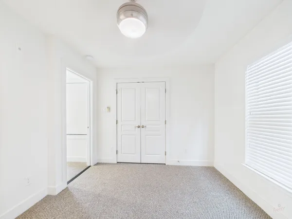 a bathroom with a toilet and sink