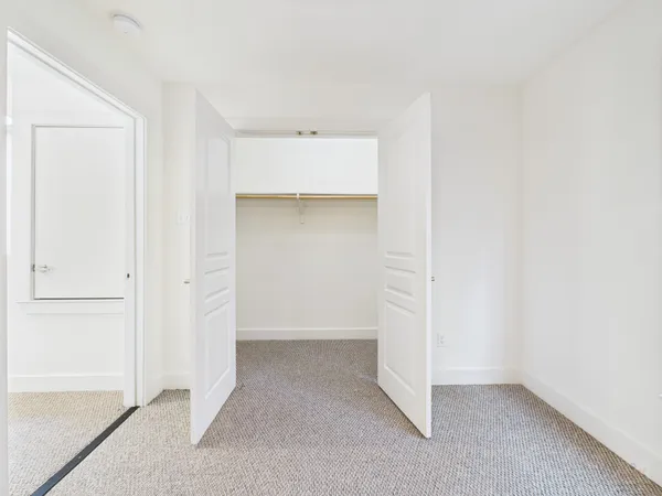 a patio with patio couch and table