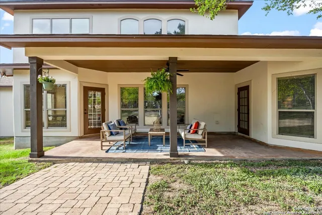 a view of a yard with a tree