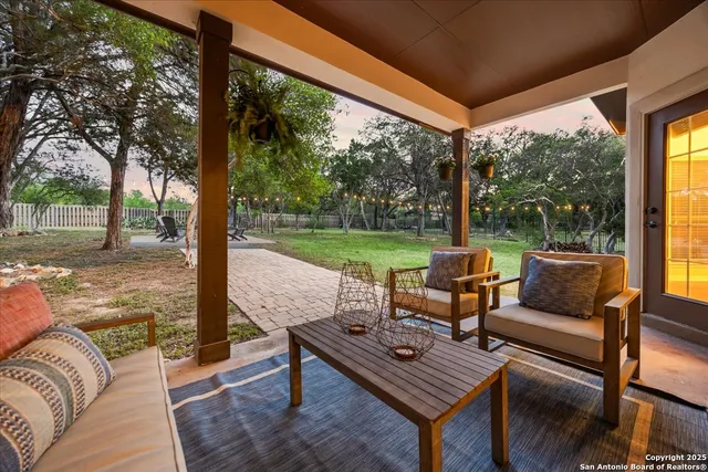 an aerial view of residential building with green space