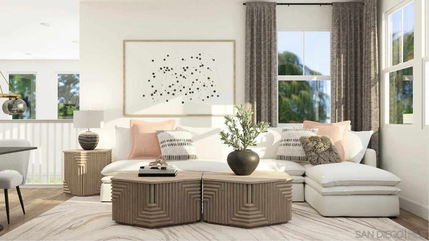17431 Abbey Road Poway, CA 92064 - Photo 23 of 30 a living room with furniture a table and a potted plant