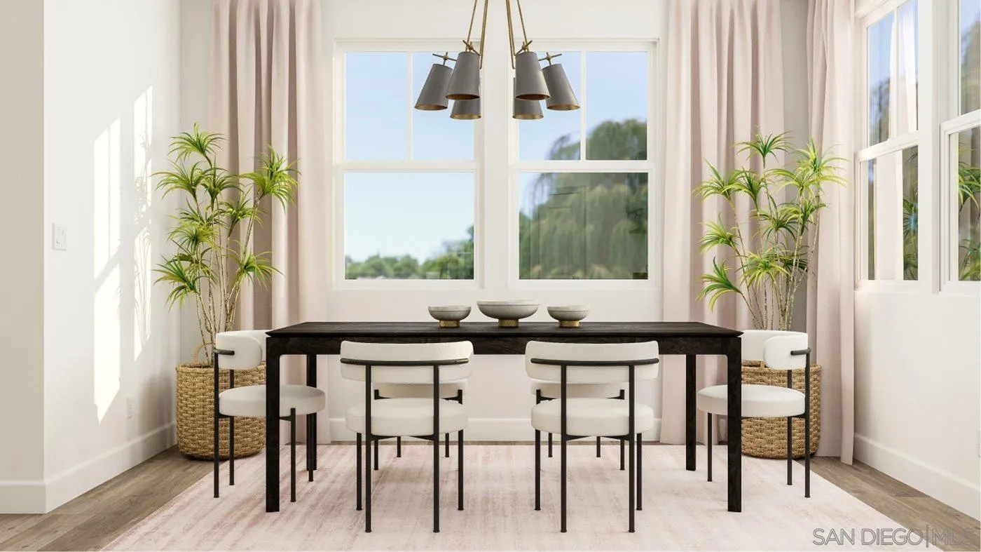 17431 Abbey Road Poway, CA 92064 - Photo 6 of 30 a table with a vase and a window