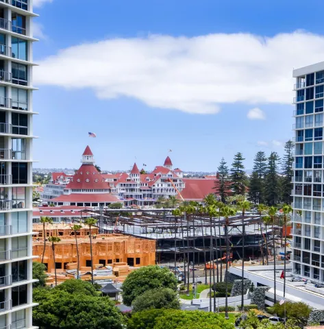 a view of a city with tall buildings
