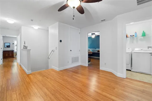 a bedroom with a bed dresser and a window