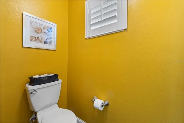 a bedroom with furniture and window