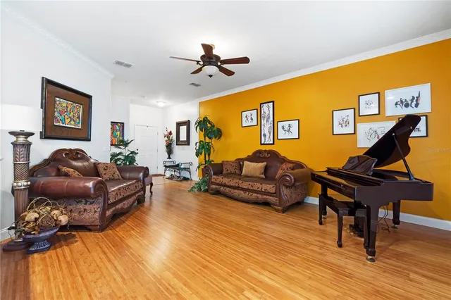 a large kitchen with stainless steel appliances lots of counter space and a sink
