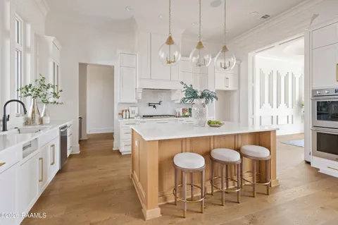 $950,000 | 305 Sunset Palm Court, Youngsville, LA 70592