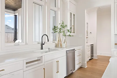 $950,000 | 305 Sunset Palm Court, Youngsville, LA 70592