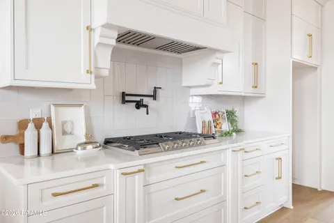 $950,000 | 305 Sunset Palm Court, Youngsville, LA 70592