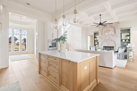 $950,000 | 305 Sunset Palm Court, Youngsville, LA 70592