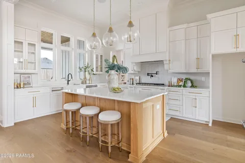 $950,000 | 305 Sunset Palm Court, Youngsville, LA 70592