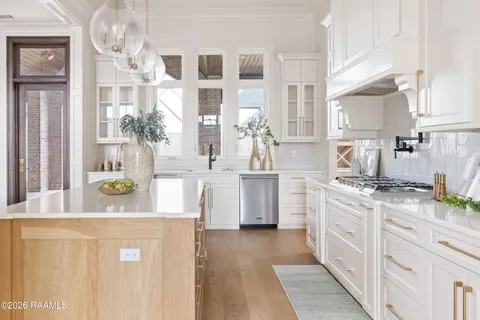 $950,000 | 305 Sunset Palm Court, Youngsville, LA 70592