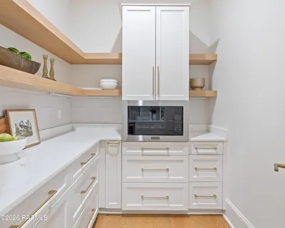 $950,000 | 305 Sunset Palm Court, Youngsville, LA 70592