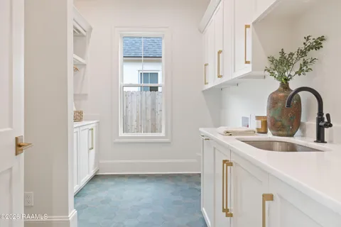 $950,000 | 305 Sunset Palm Court, Youngsville, LA 70592