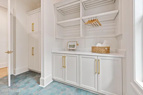 $950,000 | 305 Sunset Palm Court, Youngsville, LA 70592