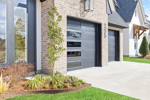 $950,000 | 305 Sunset Palm Court, Youngsville, LA 70592