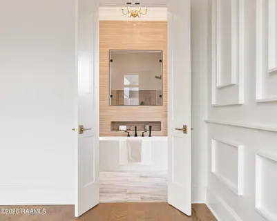 $950,000 | 305 Sunset Palm Court, Youngsville, LA 70592