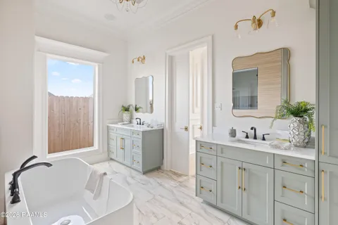 $950,000 | 305 Sunset Palm Court, Youngsville, LA 70592