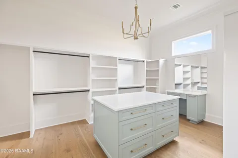 $950,000 | 305 Sunset Palm Court, Youngsville, LA 70592