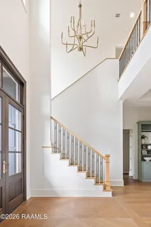 $950,000 | 305 Sunset Palm Court, Youngsville, LA 70592