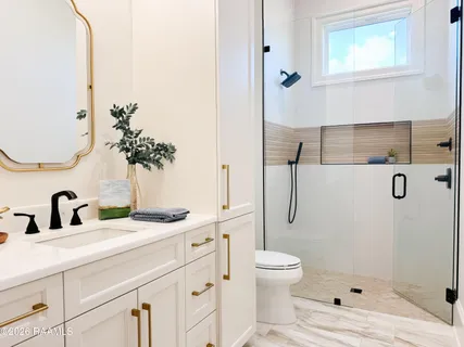 $950,000 | 305 Sunset Palm Court, Youngsville, LA 70592