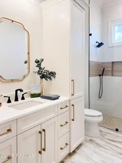 $950,000 | 305 Sunset Palm Court, Youngsville, LA 70592