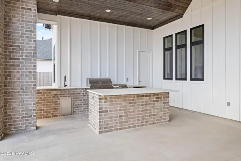 $950,000 | 305 Sunset Palm Court, Youngsville, LA 70592