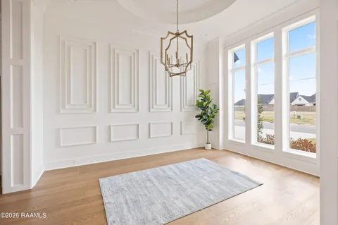 $950,000 | 305 Sunset Palm Court, Youngsville, LA 70592