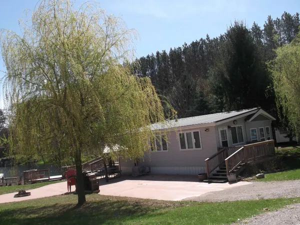 $104,900 | 2221 Grass Lake Avenue, Unit 255, Lake, MI 48632