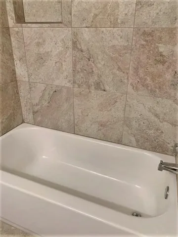 a bathroom with a bathtub