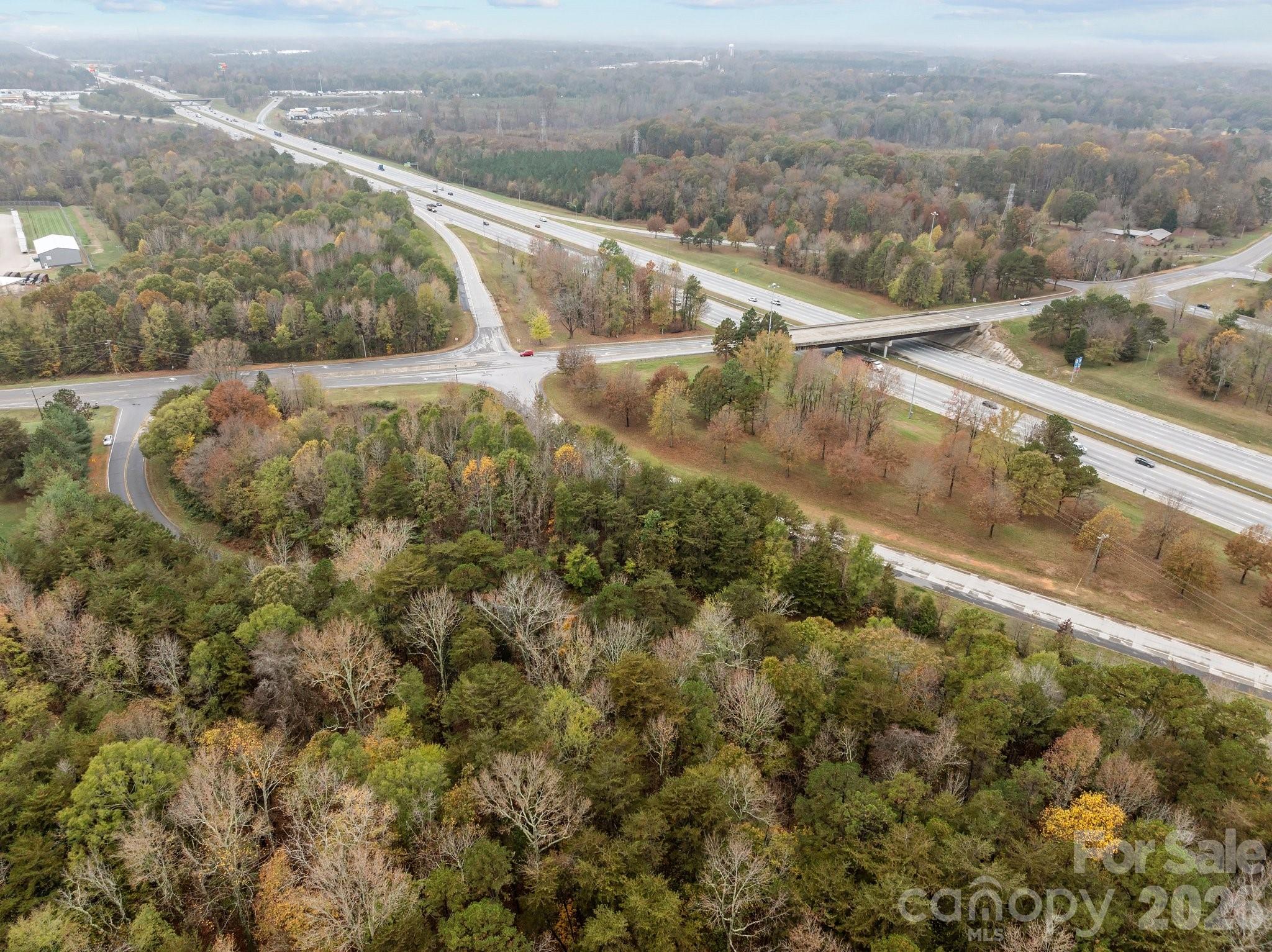 1100 Peach Orchard Road Salisbury, NC 28146 - Photo 8 of 16 a view of a lake with mountain