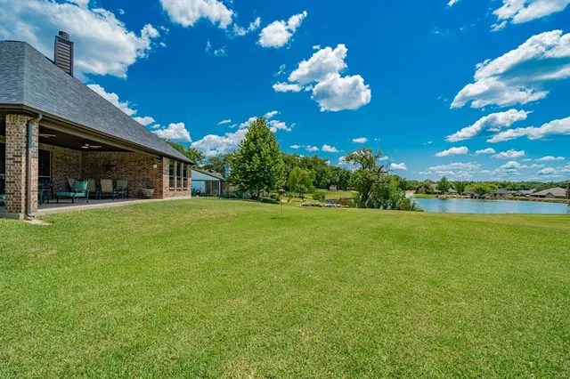 a view of a house with a big yard