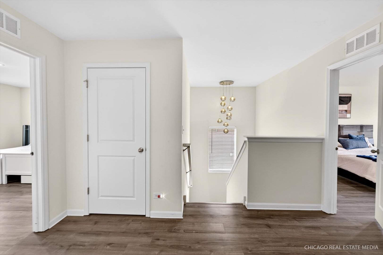 1571 Middleton Road Pingree Grove, IL 60140 - Photo 12 of 35 a view of a livingroom with wooden floor and cabinet