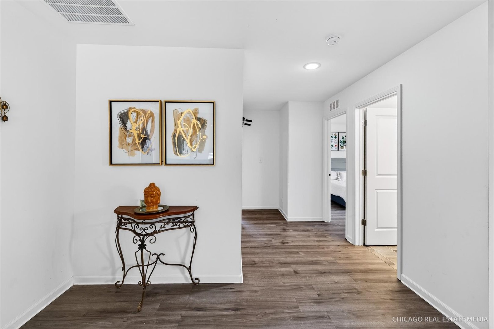 1571 Middleton Road Pingree Grove, IL 60140 - Photo 13 of 35 a view of room with painting on the wall and wooden floor
