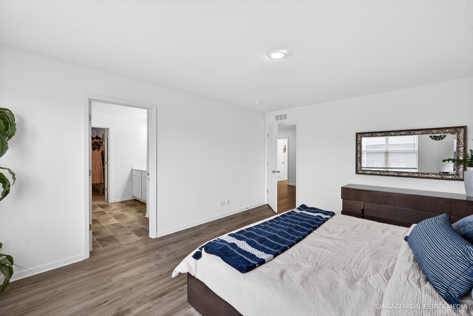 1571 Middleton Road Pingree Grove, IL 60140 - Photo 15 of 35 a bedroom with a bed and wooden floor