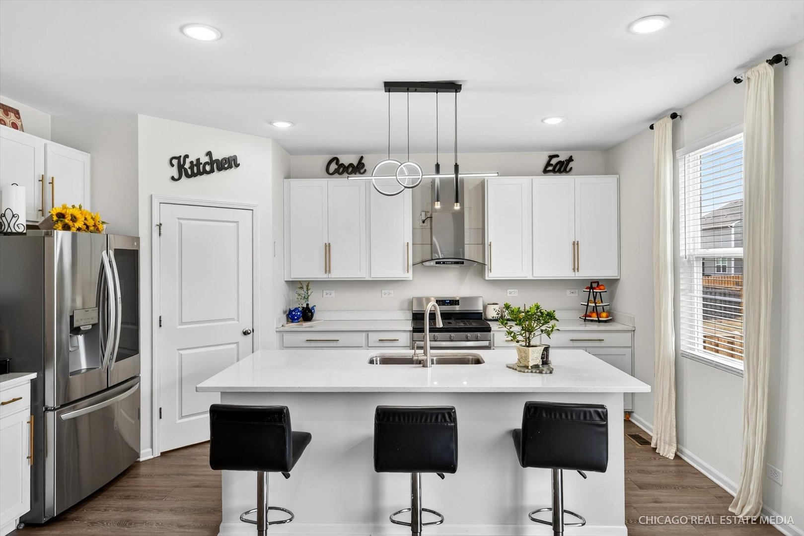1571 Middleton Road Pingree Grove, IL 60140 - Photo 8 of 35 a kitchen with stainless steel appliances granite countertop a sink and a refrigerator