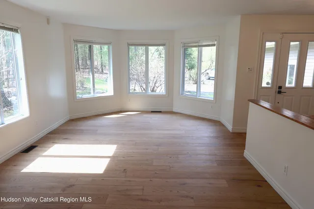 a view of livingroom with hardwood floor and window