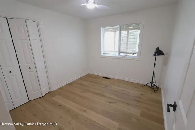 a view of a room with a window