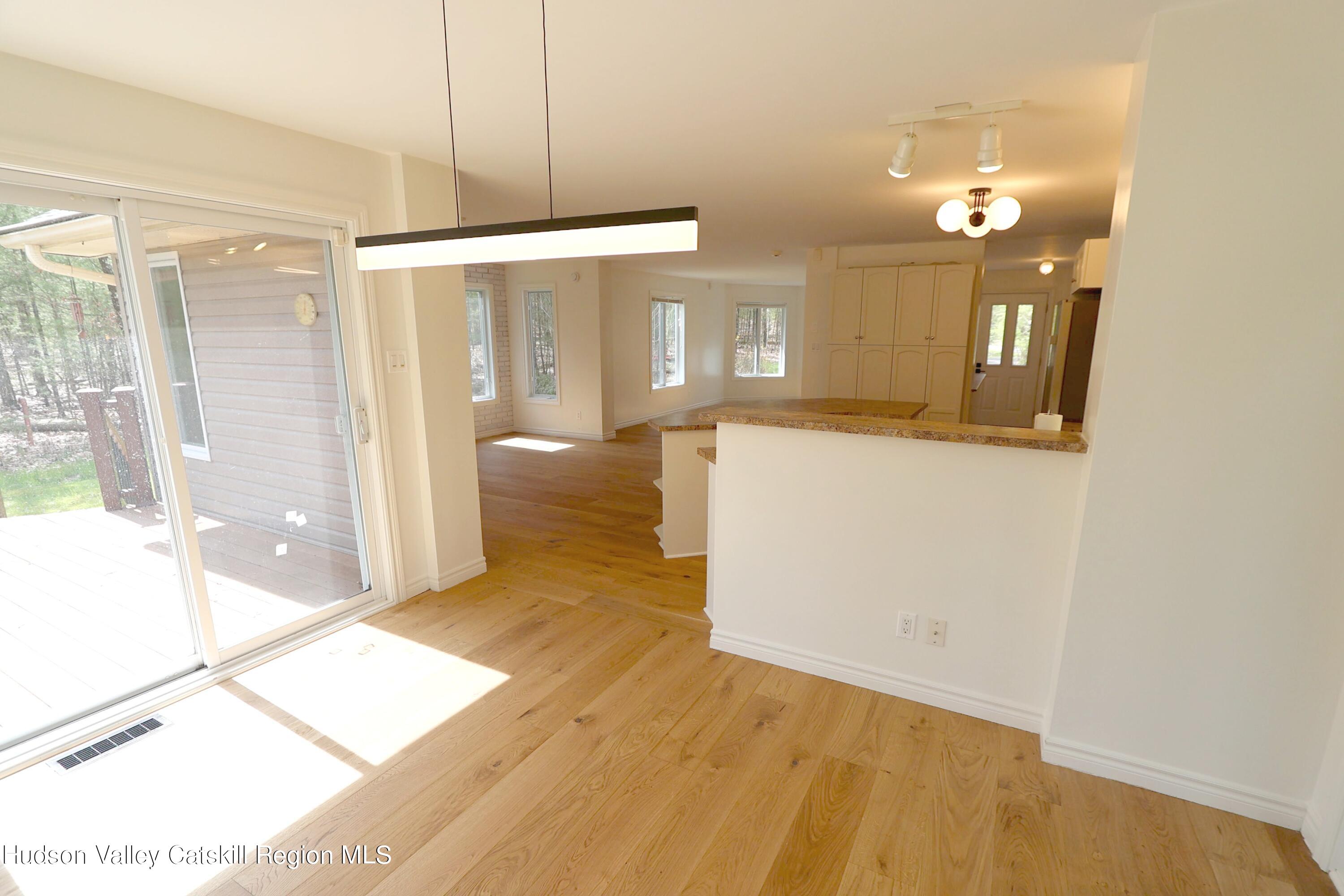 63 Lawrence Hill Road Accord, NY 12404 - Photo 24 of 27 a view of a bathroom with a tub and shower