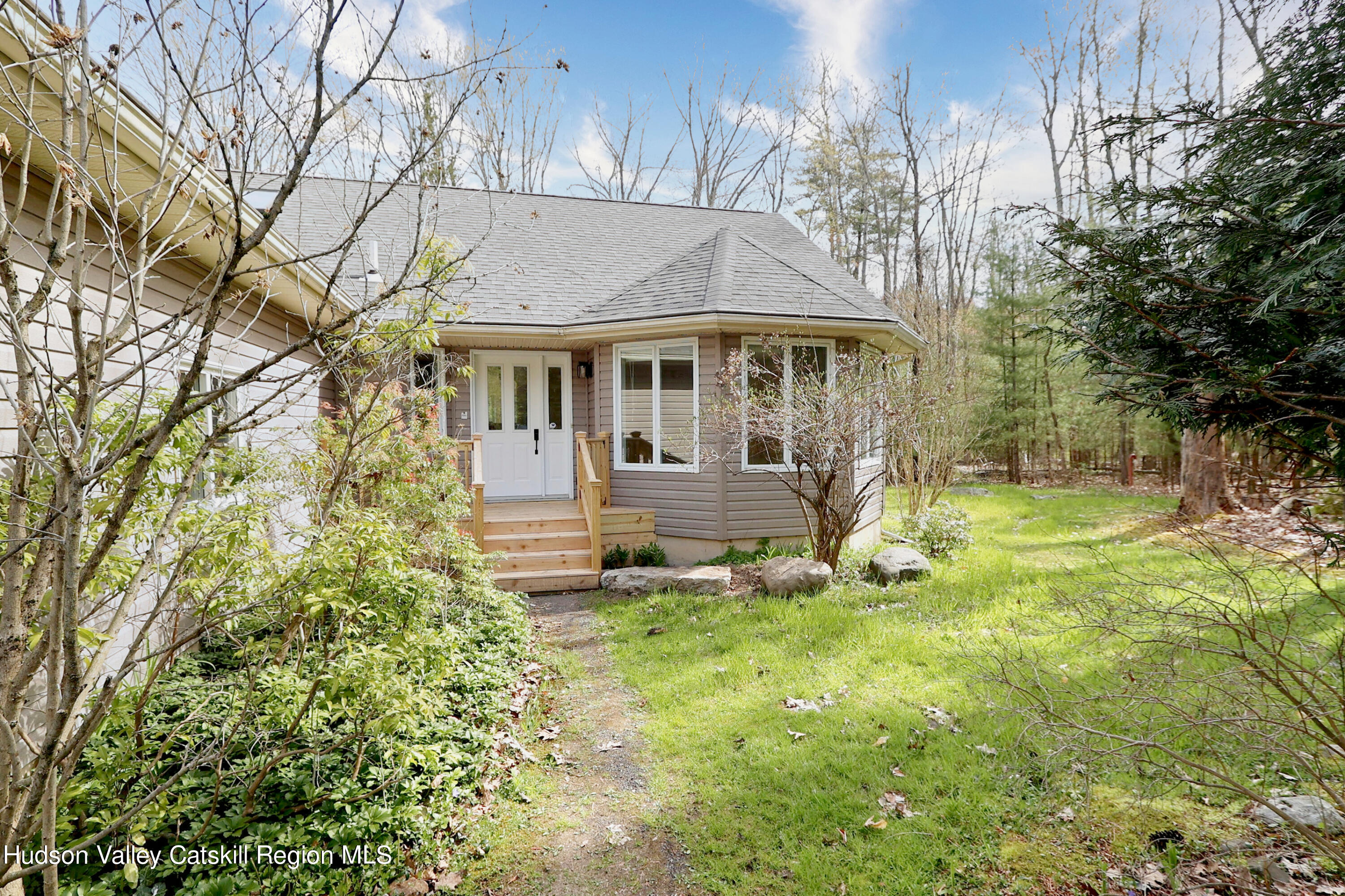 63 Lawrence Hill Road Accord, NY 12404 - Photo 4 of 27 a view of a house with backyard and garden