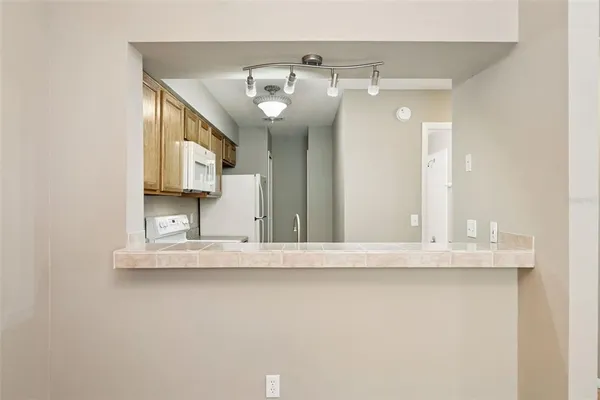 a view of a hallway with entryway