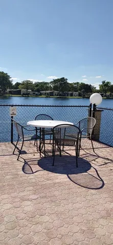 a view of a terrace with chairs