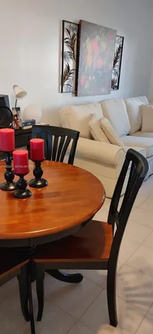 a bedroom with a bed and lamp