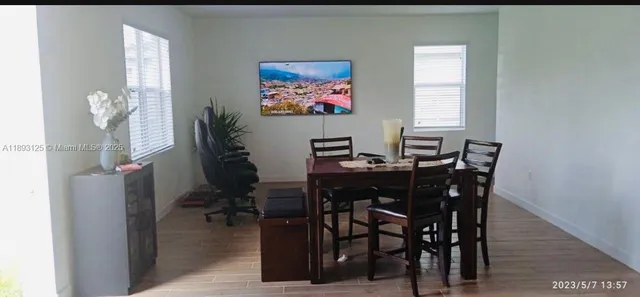a view of a dining room with furniture